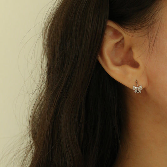 Collins Bow Huggie Earrings (White)