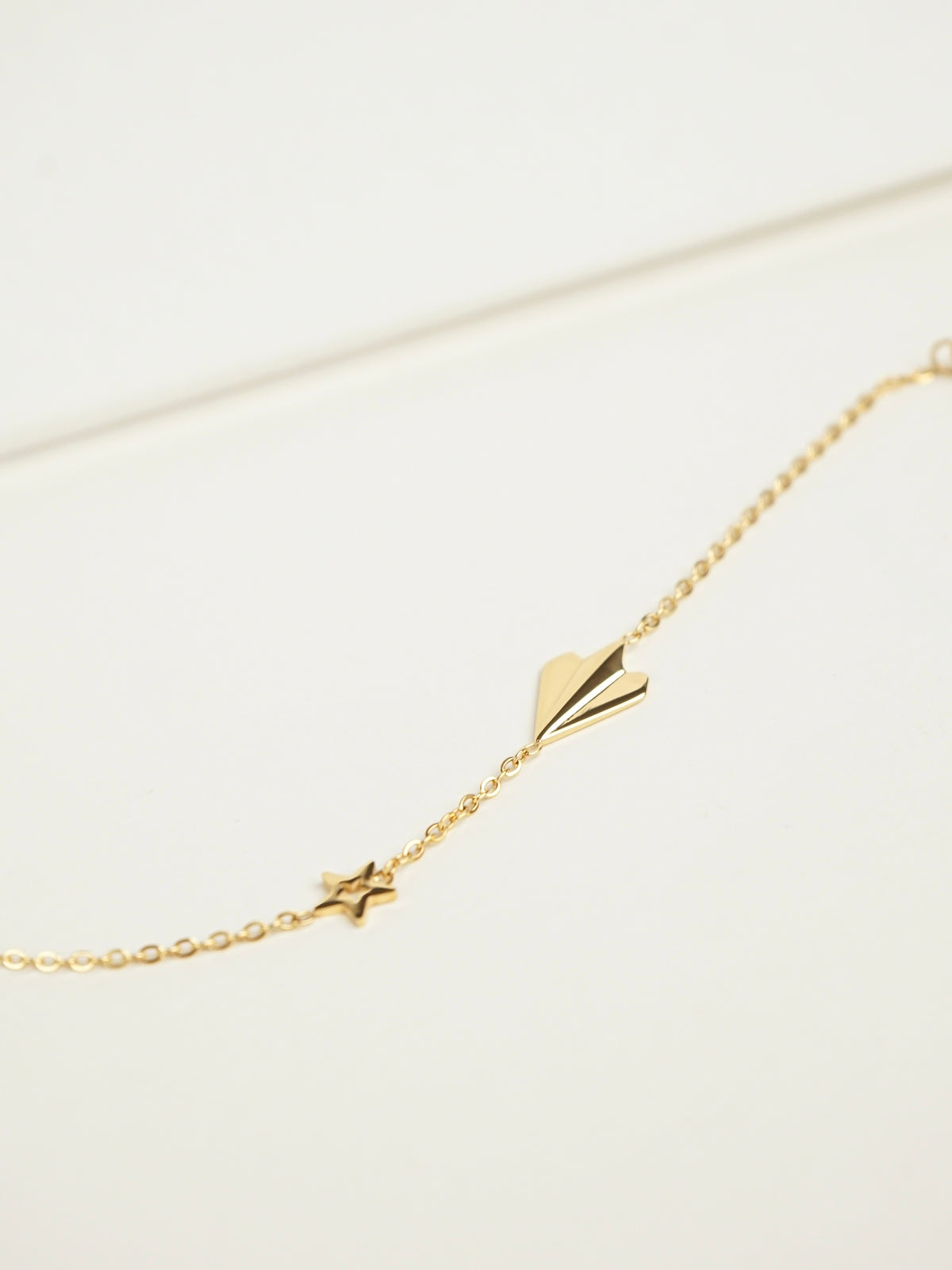Dina Paper Plane Bracelet