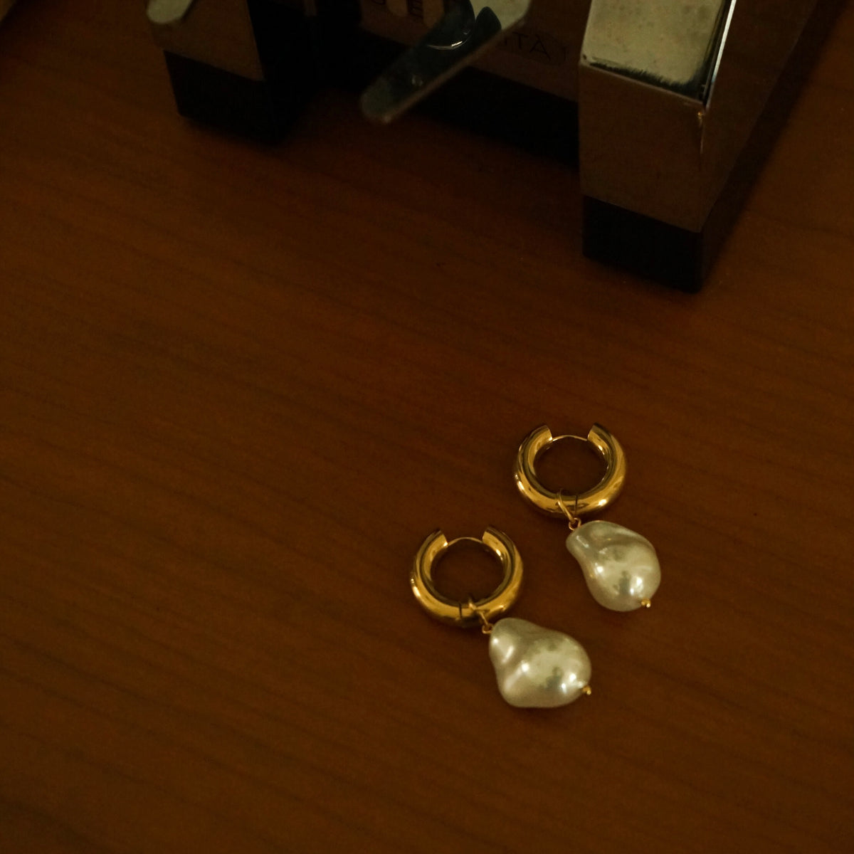 Quinzel Pearl Huggie Earrings