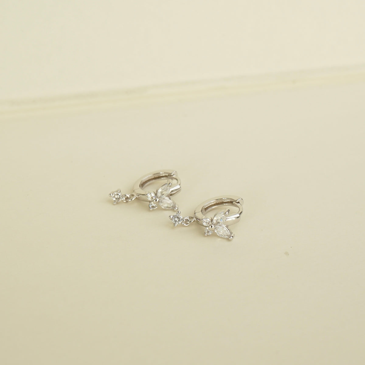 Nalani Butterfly Huggie Earrings (Silver)