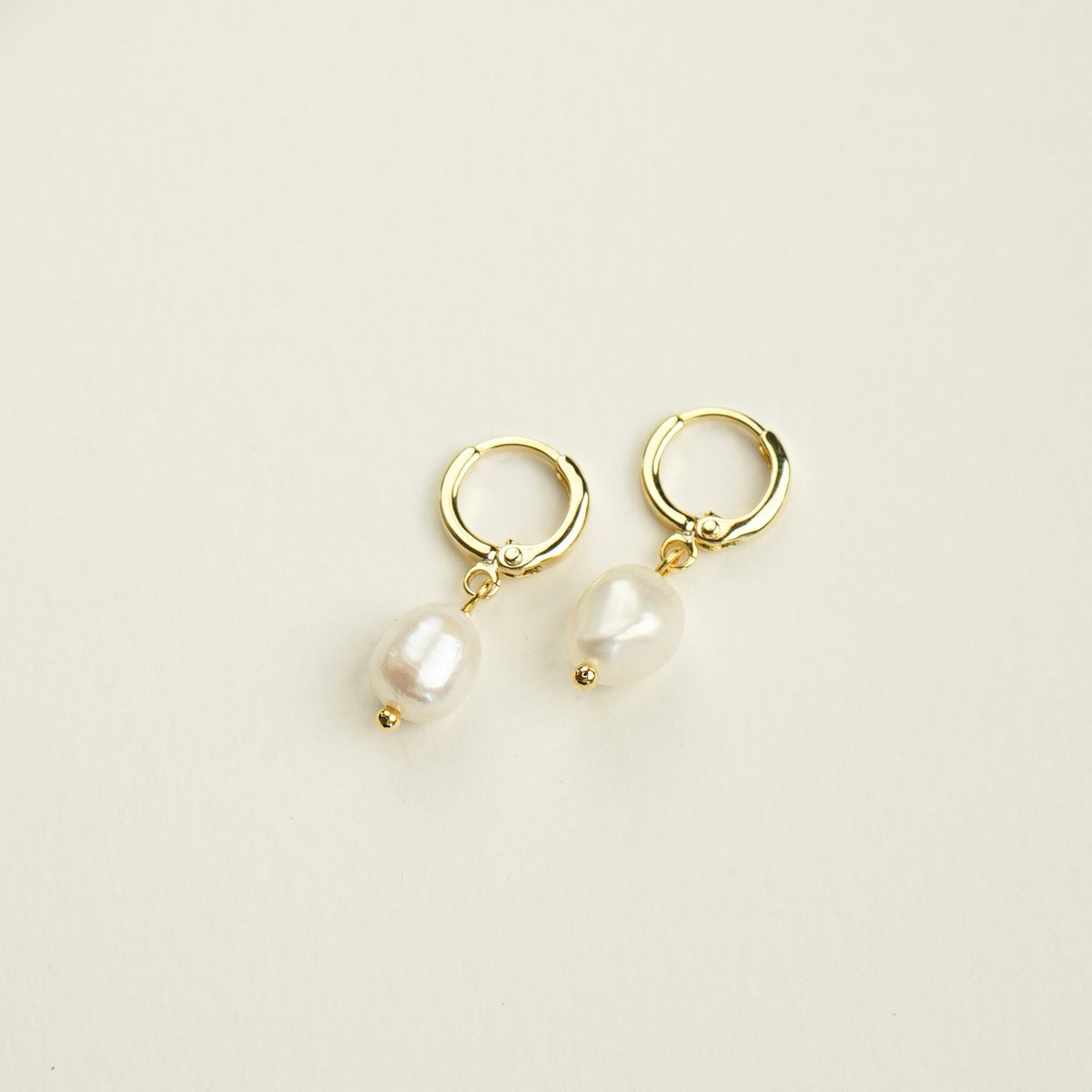 Ember Pearl Huggie Earrings