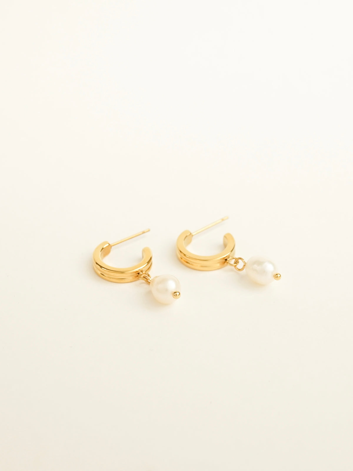 Mira Pearl Drop Huggie Earrings