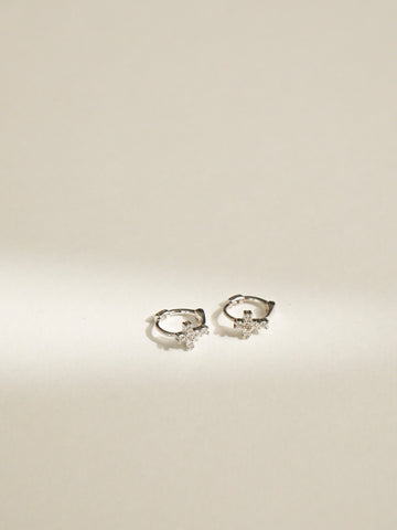 Emiliana Cross Huggie Earrings (Silver)